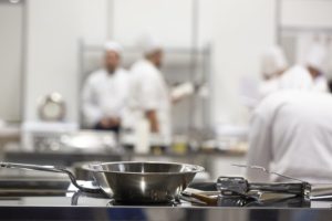 Groups of Chef cooking in the open kitchen