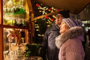 Couple looking in shop window while enjoying Bainbridge Island shopping