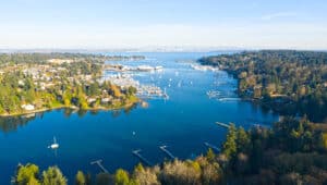 Bainbridge Island's Eagle Harbor with ferries and Seattle in the background. Bainbridge Island day trip